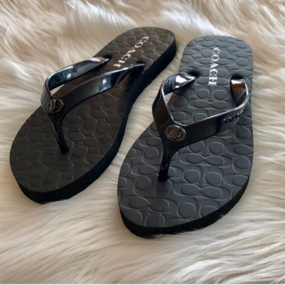 Navy blue Coach flip flops